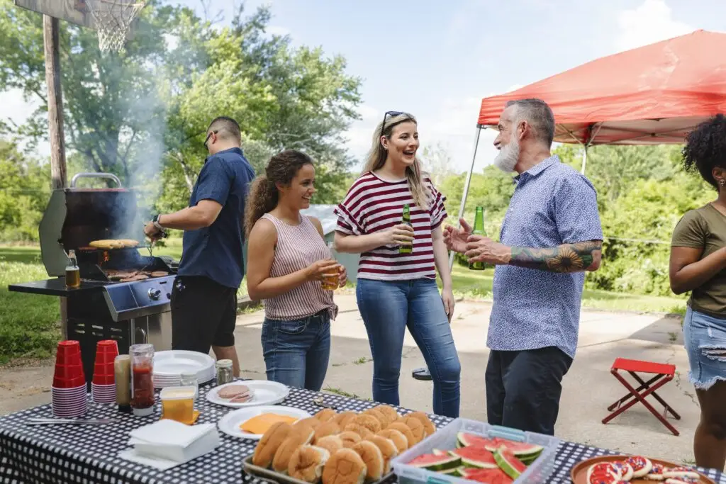 Friends celebrating together at a barbeque